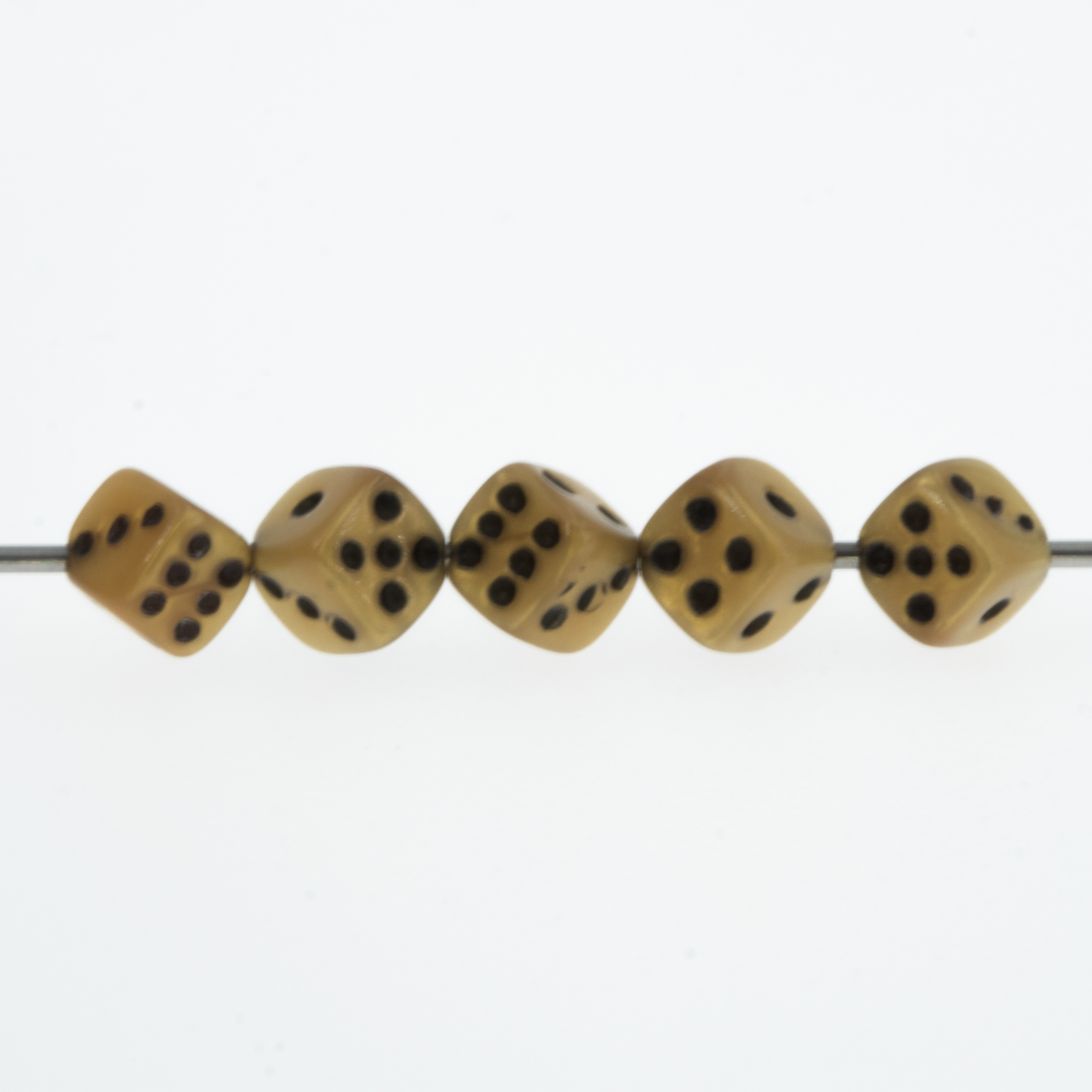  5mm Dice bead - golden color / black Silk, in